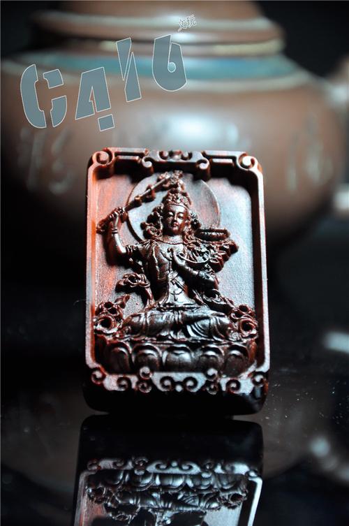 属兔的车上放什么最好？挂文殊菩萨像吗